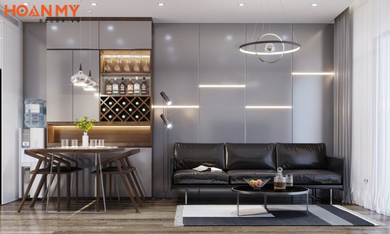 Mẫu phòng khách và bếp liên thông 20m2 tối giản với bộ sofa màu đen ấn tượng