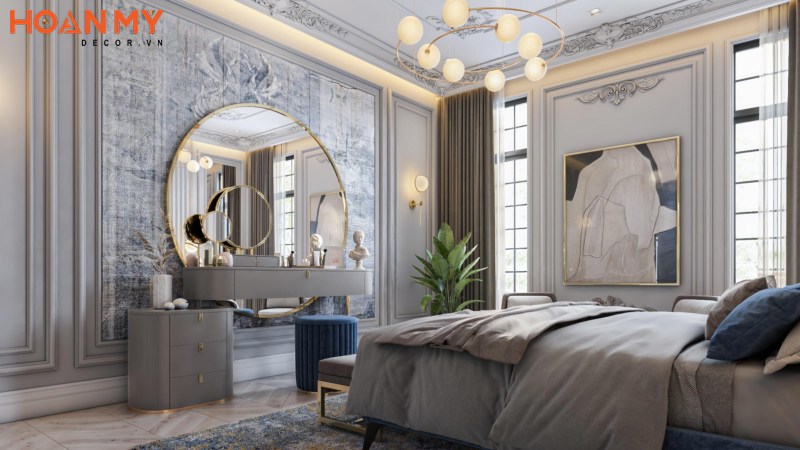 Chiếc gương trang điểm hình tròn cỡ lớn tạo sự rộng rãi cho phòng ngủ master