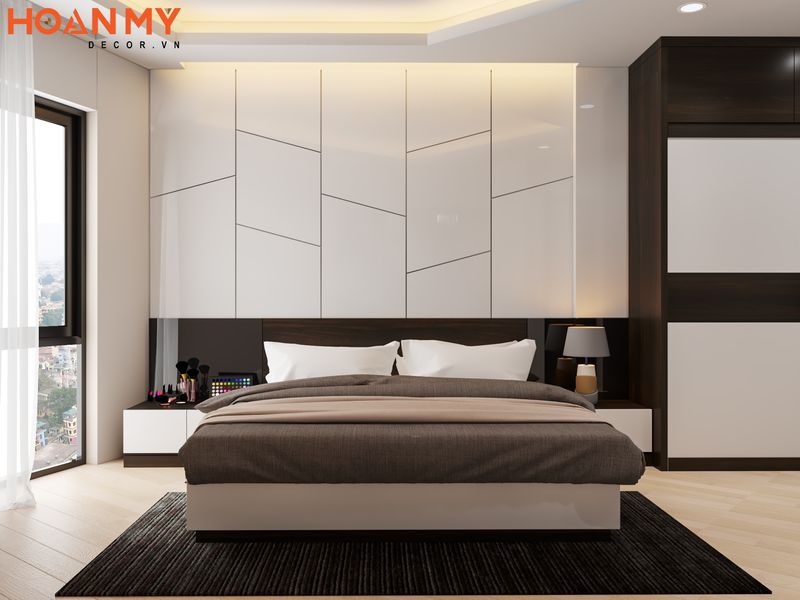 Phòng ngủ 1 được thiết kế tiện nghi ấn tượng với tấm ốp tường đầu giường