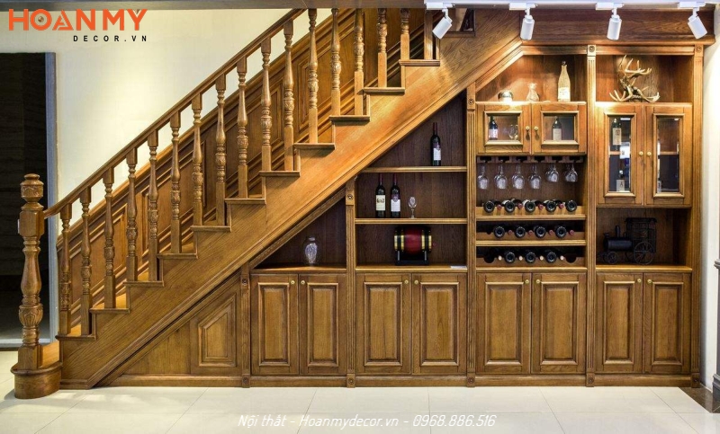 Tủ rượu gỗ Lim đẹp theo phong cách Tân cổ điển dưới gầm cầu thang