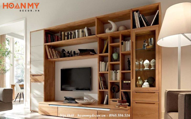 Khi kết hợp kệ tivi với tủ sách, bạn có thể tận dụng diện tích của phòng một cách thông minh