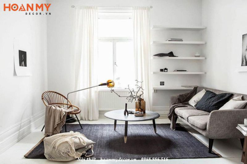 Mẫu thiết kế phòng khách tối giản với tone màu trắng kết hợp thảm trải sàn màu trắng